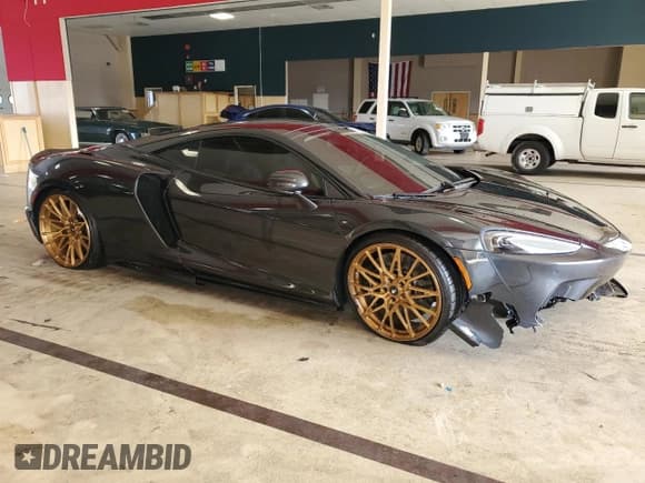✅ 2023 McLaren GT • VIN: SBM22GCAXPW002692 • Lot: 41496504. Wystawiony na Copart z przebiegiem Nie podano. Bezpłatny archiwum sprzedaży aukcyjnych z USA i szczegółowy raport historii pojazdu na DreamBid. Zdjęcie 4.