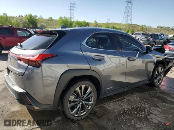 ✅ 2021 Lexus UX 250h F Sport • VIN: JTHR9JBH2M2037534 • Lot: 57075195. Listed on Copart with 33,980 mi. Free auction sales archive from the USA and detailed vehicle history report at DreamBid. Image 3.