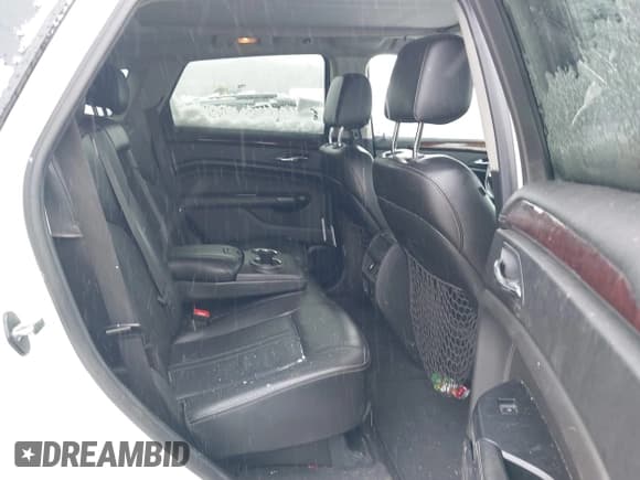 ✅ 2015 Cadillac SRX Performance Collection • VIN: 3GYFNFE3XFS527475 • Lot: 43812713. Listed on IAAI with 139,530 mi. Free auction sales archive from the USA and detailed vehicle history report at DreamBid. Image 8.