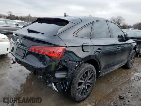 ✅ 2023 Audi SQ5 Sportback Premium Plus • VIN: WA124AFY6P2169321 • Лот: 45090115. Опубликован ранее на Copart с пробегом 23 831 миль. Бесплатный доступ к архиву аукционных продаж из США и подробный отчёт об истории автомобиля на DreamBid. Изображение 3.