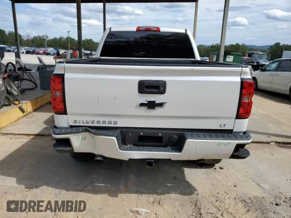 2018 Chevrolet Silverado 1500 LT с VIN 3GCUKREC1JG479772, выставлен на аукционе Copart как лот 82239365 с пробегом 92 822 миль миль и Списание • Salvage title. История ставок и продаж доступна на DreamBid. Изображение 6.