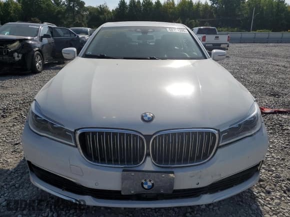 ✅ 2018 BMW 7 Series 750i • VIN: WBA7F0C51JGM23969 • Lot: 68194395. Listed on Copart with 81,171 mi. Free auction sales archive from the USA and detailed vehicle history report at DreamBid. Image 5.