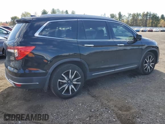 ✅ 2020 Honda Pilot Touring 7-Passenger • VIN: 5FNYF6H67LB003609 • Lot: 89931815. Listed on Copart with 96,513 mi. Free auction sales archive from the USA and detailed vehicle history report at DreamBid. Image 3.