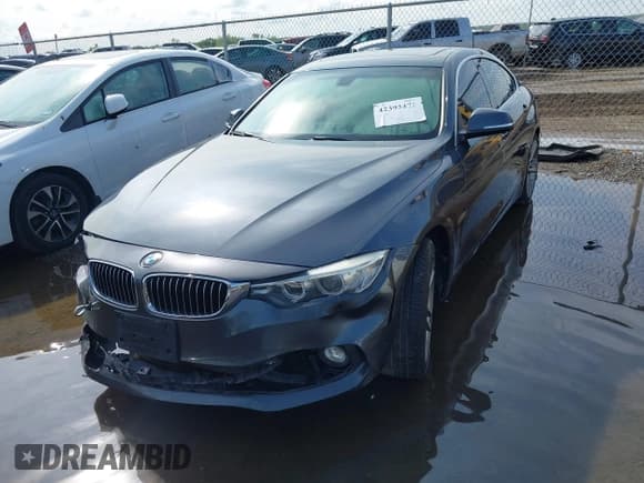 ✅ 2015 BMW 4 Series 428i • VIN: WBA4A5C51FG051247 • Lot: 42393472. Listed on IAAI with 107,804 mi. Free auction sales archive from the USA and detailed vehicle history report at DreamBid. Image 2.