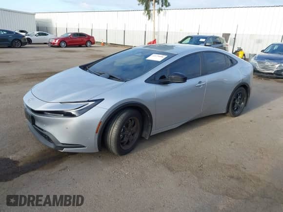 2025 Toyota Prius LE with VIN JTDACAAU4S3052719, listed as a IAAI auction lot 43175096 with 23,082 mi miles and . Bid and sale history available at DreamBid. Image 21.