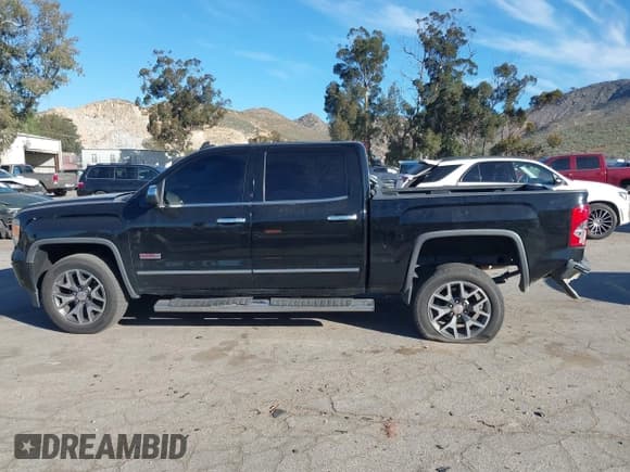 ✅ 2015 GMC Sierra 1500 SLT • VIN: 3GTU2VEC7FG108101 • Lot: 43852654. Listed on IAAI with 165,196 mi. Free auction sales archive from the USA and detailed vehicle history report at DreamBid. Image 14.