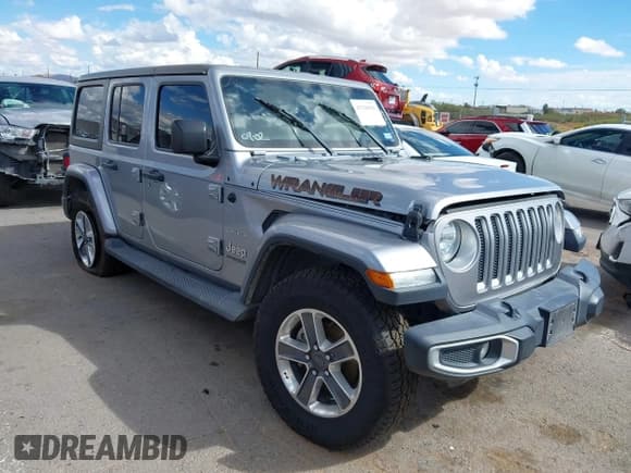 ✅ 2020 Jeep Wrangler Unlimited Sahara • VIN: 1C4HJXEN5LW235234 • Lot: 43328501. Listed on IAAI with 131,404 mi. Free auction sales archive from the USA and detailed vehicle history report at DreamBid. Image 1.