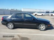 ✅ 2005 Hyundai Elantra GLS • VIN: KMHDN46D75U991942 • Lot: 42207546. Wystawiony na IAAI z przebiegiem 100 858 mil. Bezpłatny archiwum sprzedaży aukcyjnych z USA i szczegółowy raport historii pojazdu na DreamBid. Zdjęcie 13.