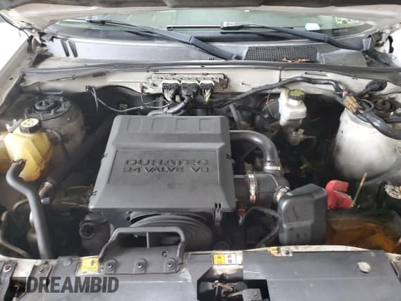 ✅ 2009 Mercury Mariner Premier • VIN: 4M2CU97G39KJ00498 • Lot: 60049555. Wystawiony na Copart z przebiegiem 97 212 mil. Bezpłatny archiwum sprzedaży aukcyjnych z USA i szczegółowy raport historii pojazdu na DreamBid. Zdjęcie 12.