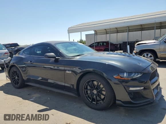 ✅ 2022 Ford Mustang GT Premium • VIN: 1FA6P8CF6N5133091 • Лот: 64253075. Опубликован ранее на Copart с пробегом 28 214 миль. Бесплатный доступ к архиву аукционных продаж из США и подробный отчёт об истории автомобиля на DreamBid. Изображение 4.
