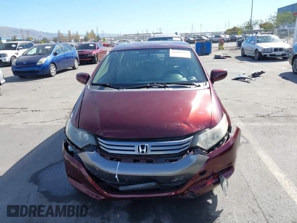 ✅ 2011 Honda Insight LX • VIN: JHMZE2H59BS012349 • Lot: 43609819. Listed on IAAI with 77,962 mi. Free auction sales archive from the USA and detailed vehicle history report at DreamBid. Image 6.