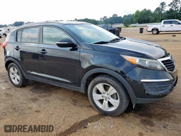 ✅ 2012 Kia Sportage LX • VIN: KNDPBCA29C7250911 • Лот: 57333445. Опубликован ранее на Copart с пробегом 216 905 миль. Бесплатный доступ к архиву аукционных продаж из США и подробный отчёт об истории автомобиля на DreamBid. Изображение 4.