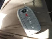 ✅ 2023 Toyota Corolla Cross XLE • VIN: 7MUDAABG7PV077220 • Lot: 43137122. Listed on IAAI with 37,620 mi. Free auction sales archive from the USA and detailed vehicle history report at DreamBid. Image 11.