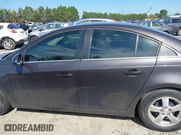 ✅ 2014 Chevrolet Cruze 1LT • VIN: 1G1PC5SB1E7218750 • Lot: 43329530. Listed on IAAI with 151,833 mi. Free auction sales archive from the USA and detailed vehicle history report at DreamBid. Image 14.