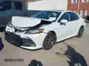 2022 Toyota Camry Hybrid XLE with VIN 4T1F31AK4NU599424, listed as a IAAI auction lot 40839336 with 68,918 mi miles and . Bid and sale history available at DreamBid. Image 2.