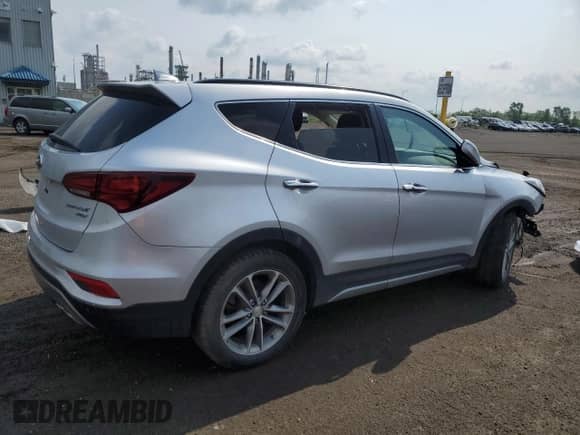 2017 Hyundai Santa Fe 2.0T with VIN 5XYZUDLA2HG463903, listed as a Copart auction lot 58937045 with Not provided miles and Salvage title. Bid and sale history available at DreamBid. Image 3.