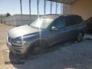 ✅ 2018 Volkswagen Tiguan S • VIN: 3VV1B7AX0JM108976 • Lot: 87282895. Listed on Copart with 187,697 mi. Free auction sales archive from the USA and detailed vehicle history report at DreamBid. Image 1.