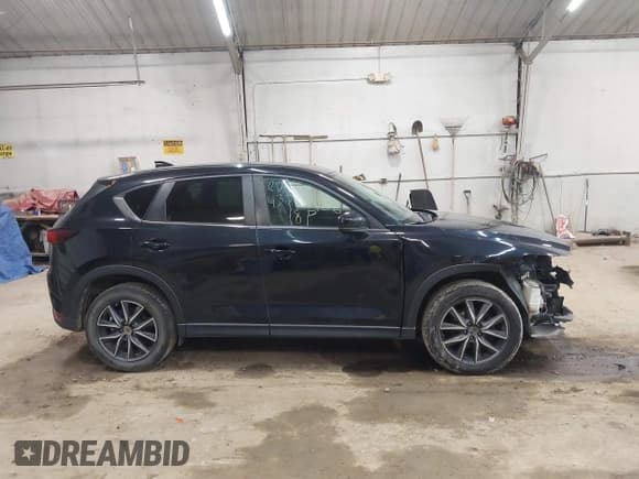 ✅ 2018 Mazda CX-5 Touring • VIN: JM3KFBCM2J0380100 • Lot: 43777906. Wystawiony na IAAI z przebiegiem 108 960 mil. Bezpłatny archiwum sprzedaży aukcyjnych z USA i szczegółowy raport historii pojazdu na DreamBid. Zdjęcie 13.