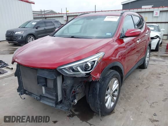 2017 Hyundai Santa Fe 2.0T z VIN 5XYZU4LA6HG409438, wystawiony jako IAAI lot #41680534 z przebiegiem 84 035 mil mil oraz . Historia ofert i sprzedaży dostępna na DreamBid. Obrazek 20.