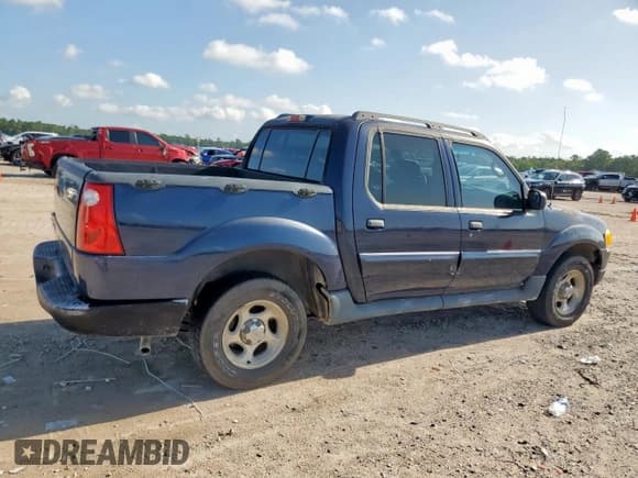 ✅ 2003 Ford Explorer Sport Trac XLS • VIN: 1FMZU67EX3UB20168 • Lot: 69243355. Wystawiony na Copart z przebiegiem 195 015 mil. Bezpłatny archiwum sprzedaży aukcyjnych z USA i szczegółowy raport historii pojazdu na DreamBid. Zdjęcie 3.