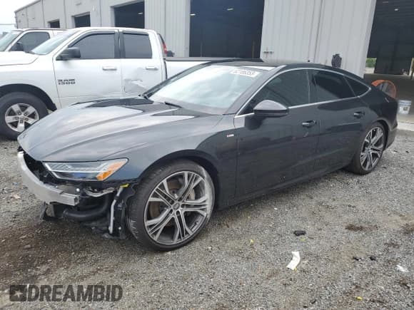 ✅ 2020 Audi A7 Prestige • VIN: WAUV2AF26LN034432 • Лот: 62186353. Опубликован ранее на Copart с пробегом 50 324 миль. Бесплатный доступ к архиву аукционных продаж из США и подробный отчёт об истории автомобиля на DreamBid. Изображение 1.