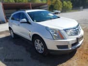 ✅ 2013 Cadillac SRX • VIN: 3GYFNAE38DS540323 • Lot: 43687296. Listed on IAAI with 143,093 mi. Free auction sales archive from the USA and detailed vehicle history report at DreamBid. Image 1.