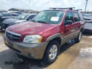 ✅ 2003 Mazda Tribute LX • VIN: 4F2YZ04143KM30747 • Lot: 42426445. Listed on IAAI with 134,338 mi. Free auction sales archive from the USA and detailed vehicle history report at DreamBid. Image 2.