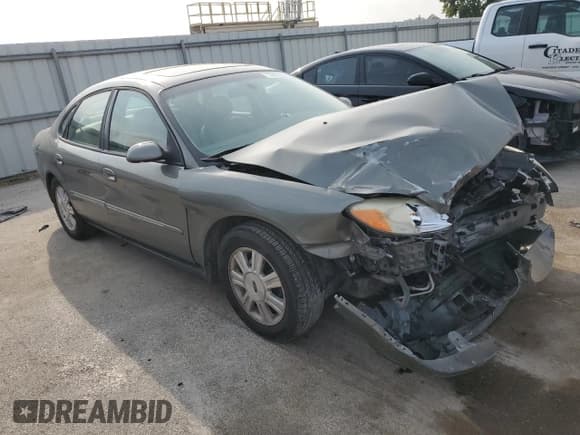 ✅ 2003 Ford Taurus SEL Deluxe • VIN: 1FAFP56S73G129866 • Lot: 72079135. Listed on Copart with 202,450 mi. Free auction sales archive from the USA and detailed vehicle history report at DreamBid. Image 4.