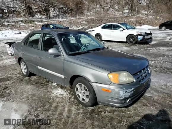 2003 Hyundai Accent GL with VIN KMHCG45C33U469496, listed as a Copart auction lot 45926595 with 77,737 mi miles and Salvage title. Bid and sale history available at DreamBid. Image 11.