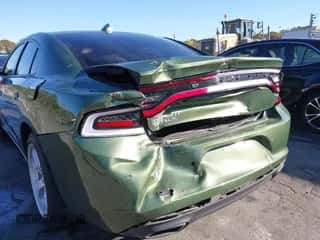 2023 Dodge Charger SXT with VIN 2C3CDXBG1PH673684, listed as a IAAI auction lot 43439756 with 13,896 mi miles and . Bid and sale history available at DreamBid. Image 6.