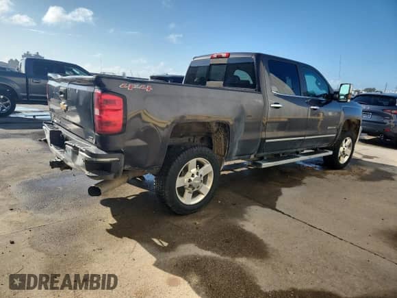 2016 Chevrolet Silverado 2500HD LTZ с VIN 1GC1KWE89GF237125, выставлен на аукционе Copart как лот 85521385 с пробегом Не указан миль и Списание • Salvage title. История ставок и продаж доступна на DreamBid. Изображение 3.