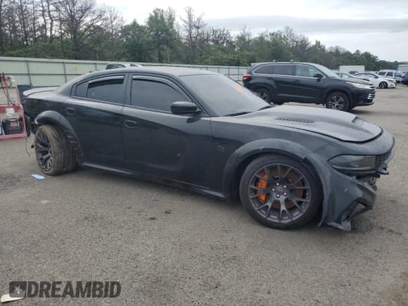 ✅ 2022 Dodge Charger SRT Hellcat Widebody • VIN: 2C3CDXL97NH163644 • Лот: 62159065. Опубликован ранее на Copart с пробегом 21 814 миль. Бесплатный доступ к архиву аукционных продаж из США и подробный отчёт об истории автомобиля на DreamBid. Изображение 4.
