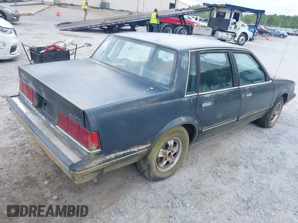 ✅ 1987 Chevrolet Celebrity • VIN: 1G1AW51W9H6195195 • Лот: 42040092. Опубликован ранее на IAAI с пробегом 117 321 миль. Бесплатный доступ к архиву аукционных продаж из США и подробный отчёт об истории автомобиля на DreamBid. Изображение 4.