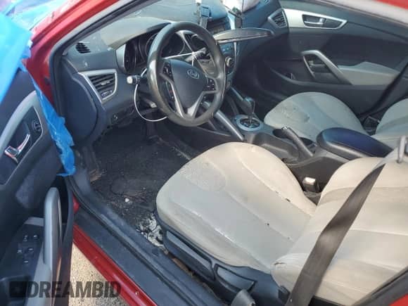 2012 Hyundai Veloster w/Gray Int с VIN KMHTC6AD8CU051215, выставлен на аукционе Copart как лот 70504994 с пробегом 162 522 миль миль и Списание • Salvage title. История ставок и продаж доступна на DreamBid. Изображение 8.