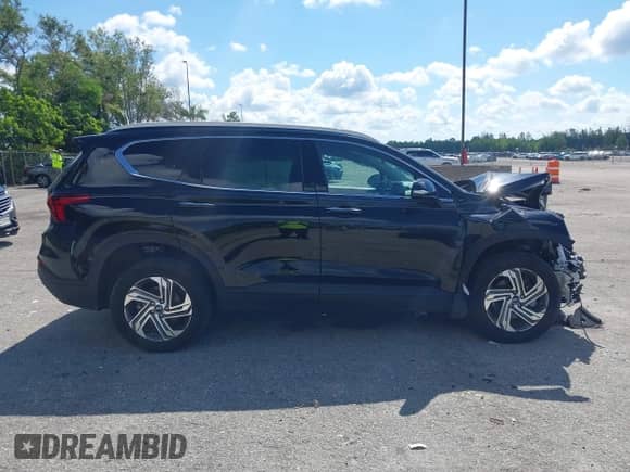 2023 Hyundai Santa Fe SEL z VIN 5NMS24AJ7PH599328, wystawiony jako IAAI lot #43043245 z przebiegiem 22 136 mil mil oraz . Historia ofert i sprzedaży dostępna na DreamBid. Obrazek 13.