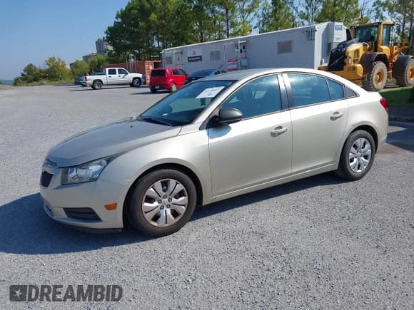 ✅ 2013 Chevrolet Cruze LS • VIN: 1G1PA5SH8D7155137 • Lot: 43170057. Listed on IAAI with 130,787 mi. Free auction sales archive from the USA and detailed vehicle history report at DreamBid. Image 2.