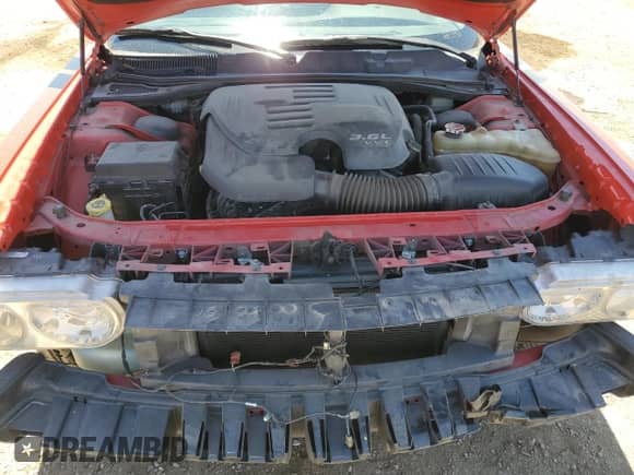 2014 Dodge Challenger SXT 100th Anniversary with VIN 2C3CDYAG7EH195680, listed as a Copart auction lot 53639755 with 153,879 mi miles and Salvage title. Bid and sale history available at DreamBid. Image 11.