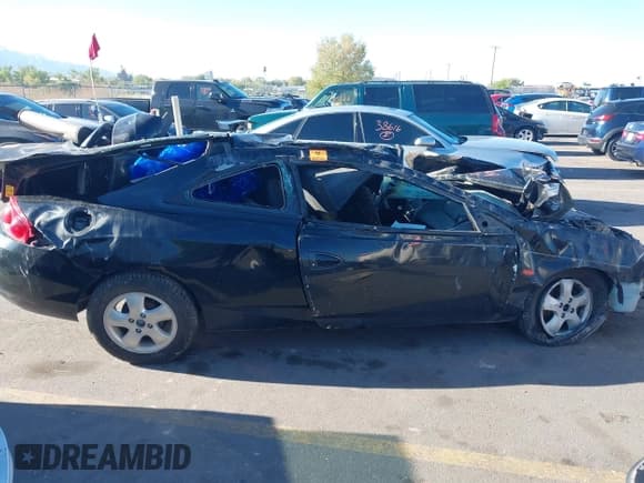 ✅ 2000 Mercury Cougar • VIN: 1ZWHT61LXY5612168 • Lot: 42056837. Wystawiony na IAAI z przebiegiem Nie podano. Bezpłatny archiwum sprzedaży aukcyjnych z USA i szczegółowy raport historii pojazdu na DreamBid. Zdjęcie 13.