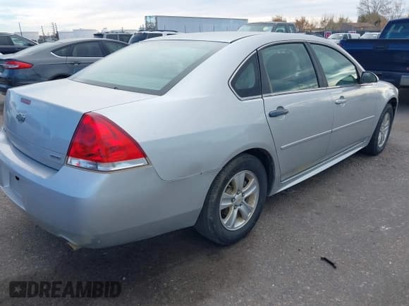 ✅ 2015 Chevrolet Impala LS • VIN: 2G1WA5E33F1152402 • Lot: 43663086. Listed on IAAI with 147,730 mi. Free auction sales archive from the USA and detailed vehicle history report at DreamBid. Image 4.