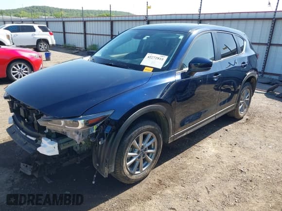 ✅ 2023 Mazda CX-5 S Carbon Edition • VIN: JM3KFBCM2P0250701 • Lot: 42272818. Listed on IAAI with 11,949 mi. Free auction sales archive from the USA and detailed vehicle history report at DreamBid. Image 2.