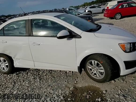 2012 Chevrolet Sonic LS с VIN 1G1JB5SHXC4226373, выставлен на аукционе Copart как лот 69846894 с пробегом 91 631 миль миль и Списание • Salvage title. История ставок и продаж доступна на DreamBid. Изображение 11.