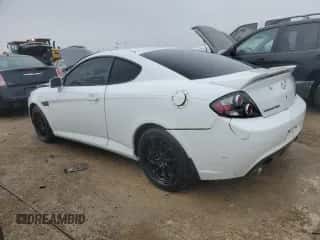 2008 Hyundai Tiburon GS с VIN KMHHM66DX8U290154, выставлен на аукционе Copart как лот 67054434 с пробегом 191 963 миль миль и На запчасти • Non repairable. История ставок и продаж доступна на DreamBid. Изображение 2.