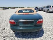 ✅ 2002 Jaguar XK • VIN: SAJDA42C62NA25816 • Lot: 52802525. Wystawiony na Copart z przebiegiem Nie podano. Bezpłatny archiwum sprzedaży aukcyjnych z USA i szczegółowy raport historii pojazdu na DreamBid. Zdjęcie 6.