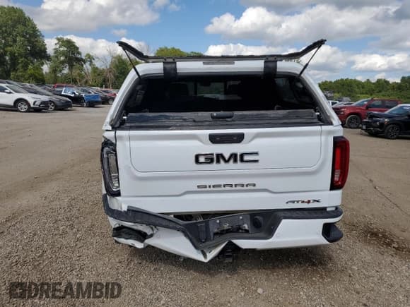 ✅ 2023 GMC Sierra 1500 AT4X • VIN: 3GTUUFELXPG131132 • Лот: 69287445. Опубликован ранее на Copart с пробегом 87 210 миль. Бесплатный доступ к архиву аукционных продаж из США и подробный отчёт об истории автомобиля на DreamBid. Изображение 6.