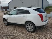✅ 2012 Cadillac SRX Premium Collection • VIN: 3GYFNFE33CS547367 • Лот: 67122365. Опубликован ранее на Copart с пробегом 136 102 миль. Бесплатный доступ к архиву аукционных продаж из США и подробный отчёт об истории автомобиля на DreamBid. Изображение 2.