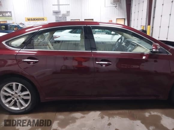 ✅ 2014 Toyota Avalon Limited • VIN: 4T1BK1EB9EU120734 • Lot: 41984803. Wystawiony na IAAI z przebiegiem 80 747 mil. Bezpłatny archiwum sprzedaży aukcyjnych z USA i szczegółowy raport historii pojazdu na DreamBid. Zdjęcie 13.