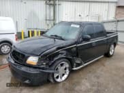 ✅ 2003 Ford F-150 Harley-Davidson • VIN: 1FTRW07333KD41438 • Lot: 54342755. Listed on Copart with 216,391 mi. Free auction sales archive from the USA and detailed vehicle history report at DreamBid. Image 1.