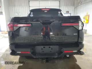 2023 Hyundai Santa Cruz SEL с VIN 5NTJBDAE7PH074711, выставлен на аукционе Copart как лот 85449074 с пробегом 13 922 миль миль и Списание • Salvage title. История ставок и продаж доступна на DreamBid. Изображение 6.