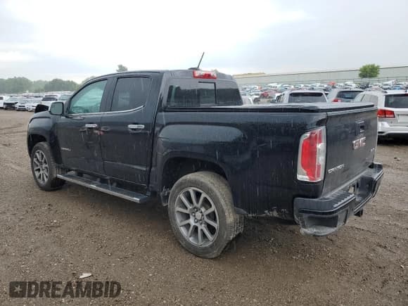 ✅ 2019 GMC Canyon 4WD Denali • VIN: 1GTG6EEN0K1354368 • Lot: 61587435. Listed on Copart with 71,965 mi. Free auction sales archive from the USA and detailed vehicle history report at DreamBid. Image 2.
