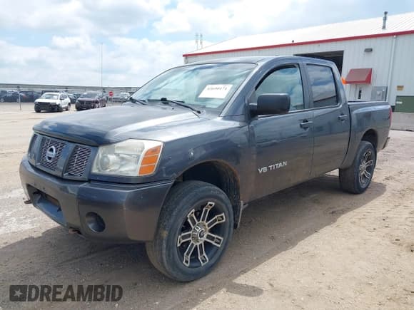 ✅ 2005 Nissan Titan LE • VIN: 1N6BA07B05N539366 • Lot: 42690171. Listed on IAAI with 202,689 mi. Free auction sales archive from the USA and detailed vehicle history report at DreamBid. Image 2.